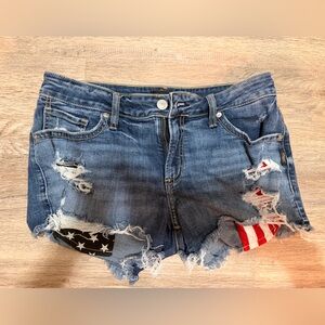 Silver Jeans Blue Ripped Denim Cutoff Shorts with Flag Inset
